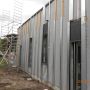 Construction de bureaux en Aquitaine, revêtement Fundermax: Panneau plan à base de résine thermodurcissable et de fibre de bois. img
