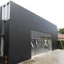 Construction de bureaux en Aquitaine, revêtement Fundermax: Panneau plan à base de résine thermodurcissable et de fibre de bois. img